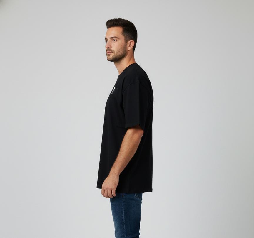 Close-up of anime graphic print on black oversized T-shirt