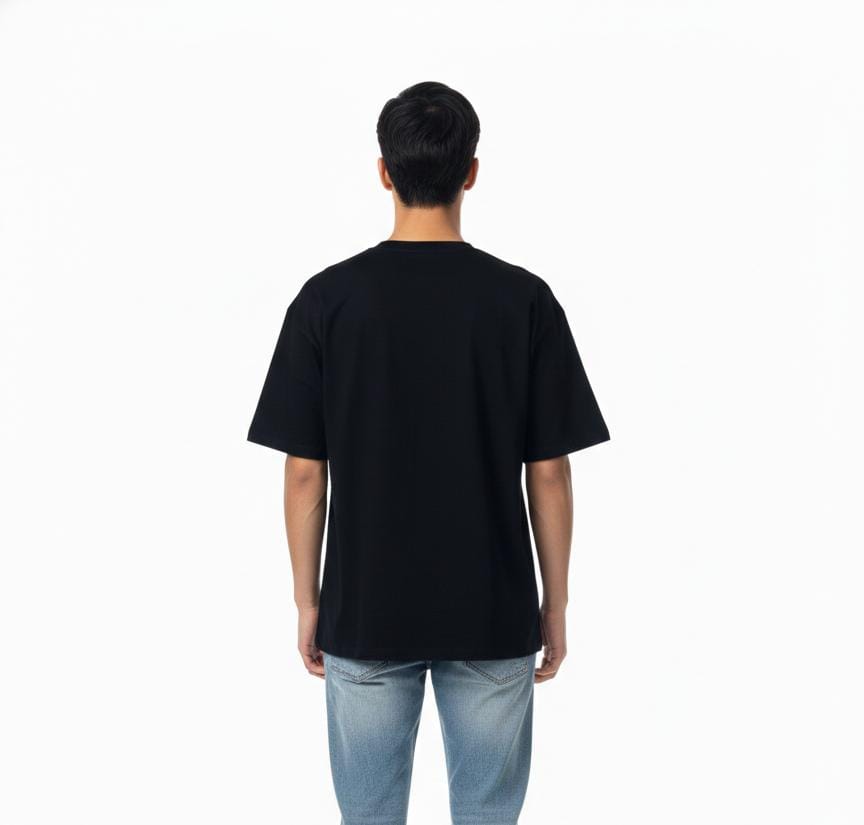 Back view of men’s black oversized superhero streetwear T-shirt