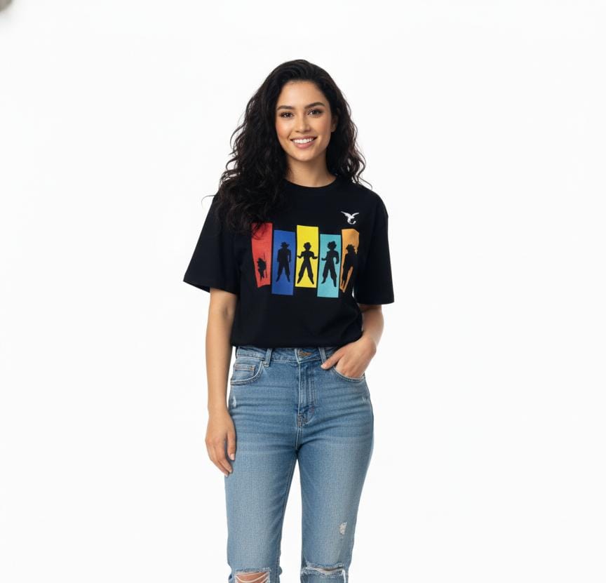 Full body view of men’s black oversized superhero graphic T-shirt with jeans