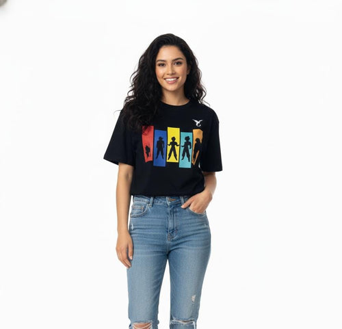 Full body view of men’s black oversized superhero graphic T-shirt with jeans